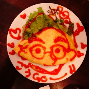 お客様の顔が書かれたオムレツ。。